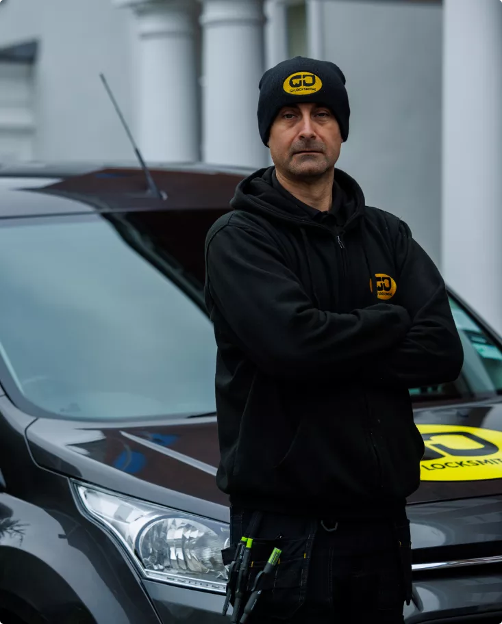 Local locksmith Martin of GJ Locksmiths standing infront of works van